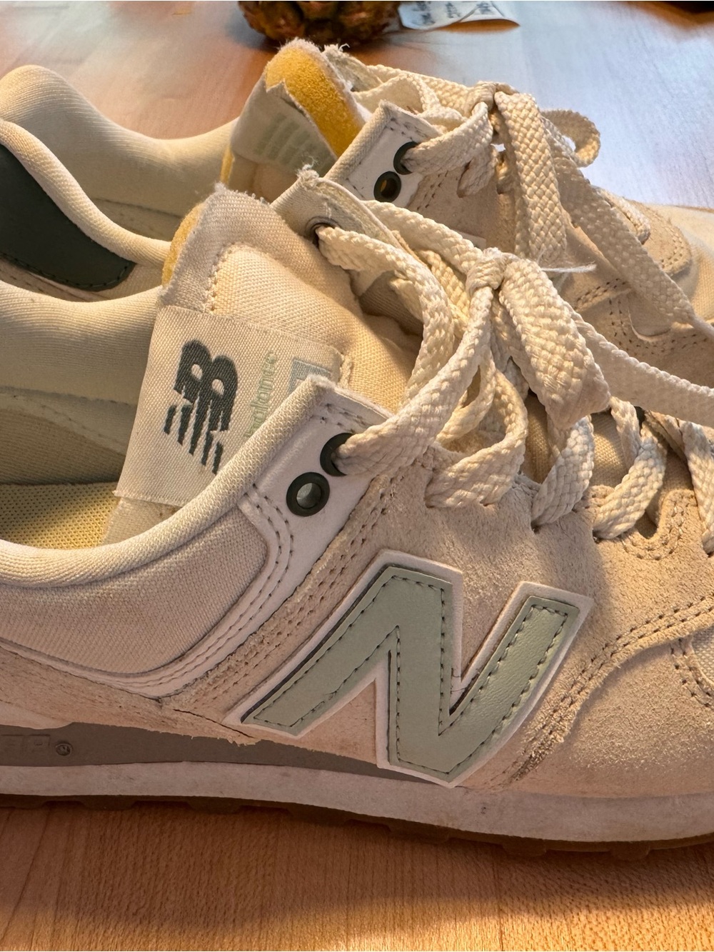 New Balance Off-White Sneakers with Mint Logo and Yellow Tongue
